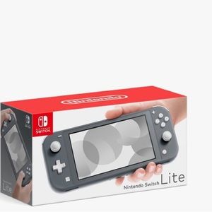 Nintendo switch lite used no scratch come with charger and a Mario game